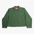 The bandit green zip-up jacket with brown corduroy collar and embroidered logo