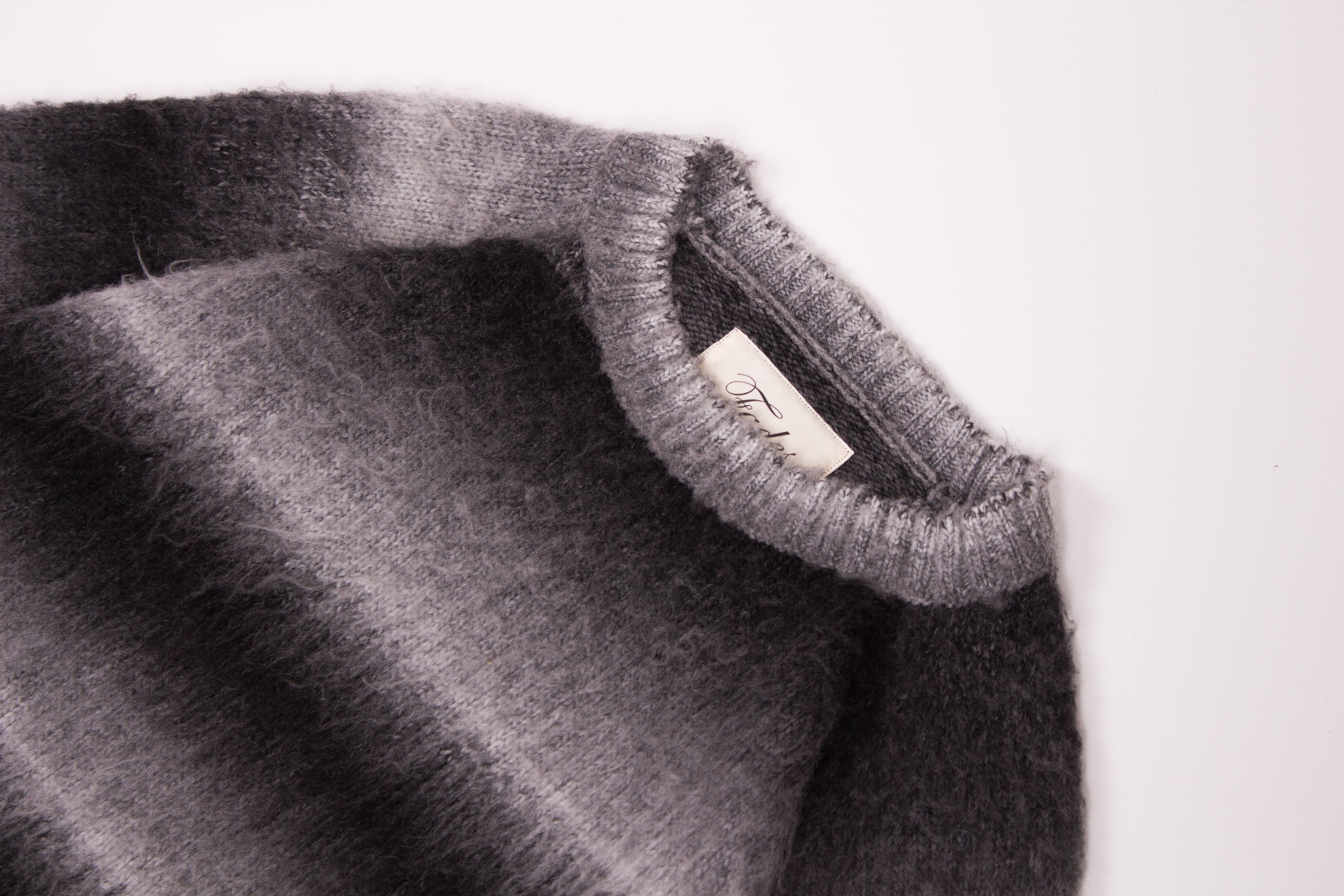 Mountain Sweater Grey by Fades ribbed collar and interior label detail