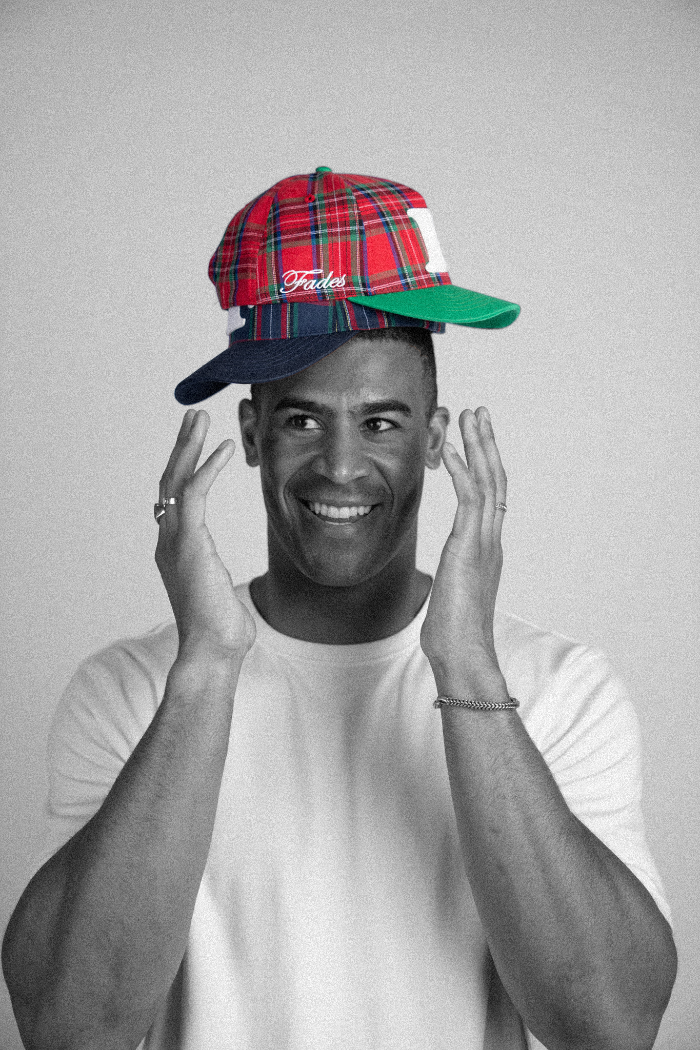 Plaid “F” Snapback by Fades red and green plaid snapback hat worn by model