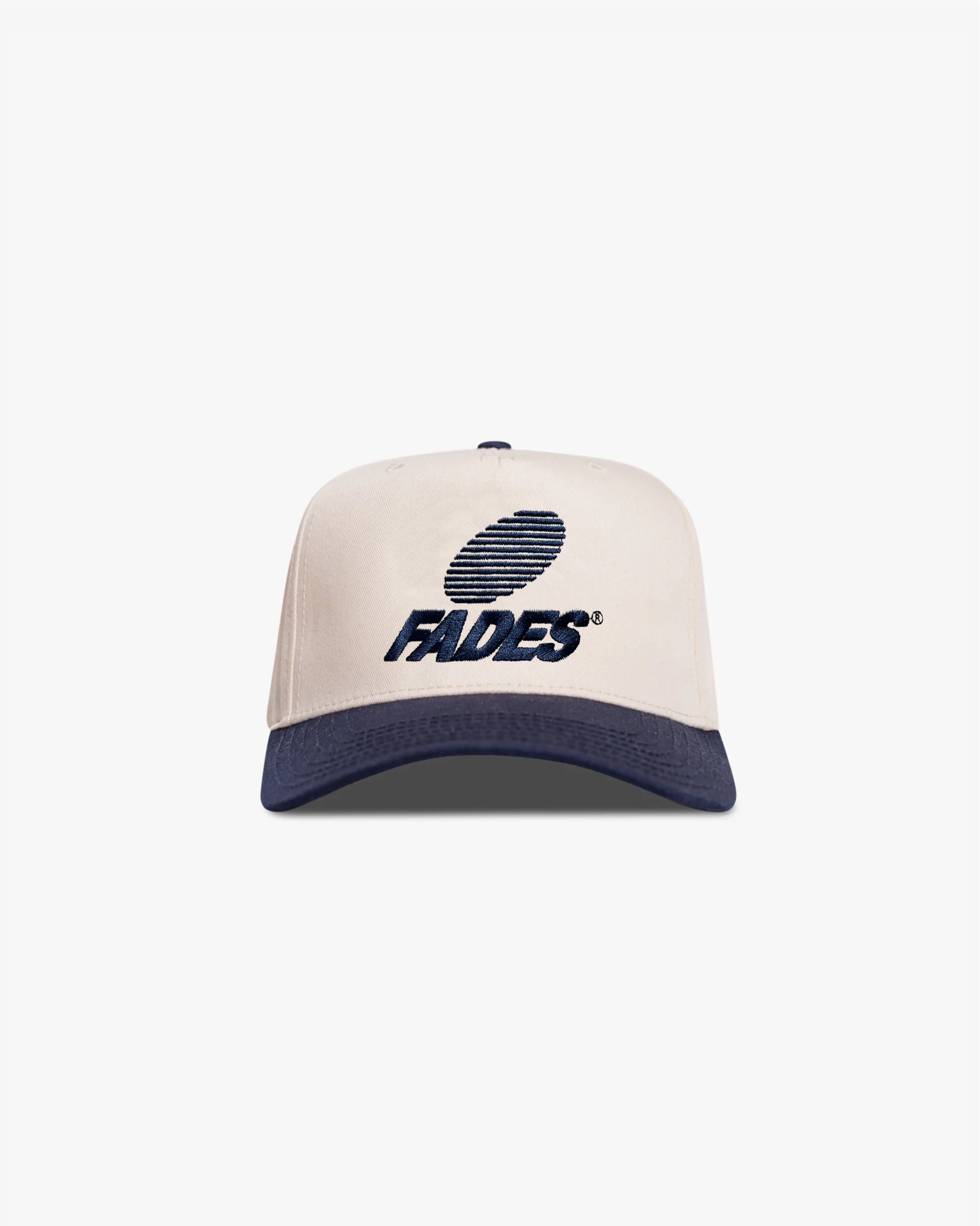 Thumbprint Hat by Fades white and navy cotton polyester snapback hat with embroidered logo
